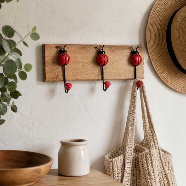 Percha mariquita 3 pomos